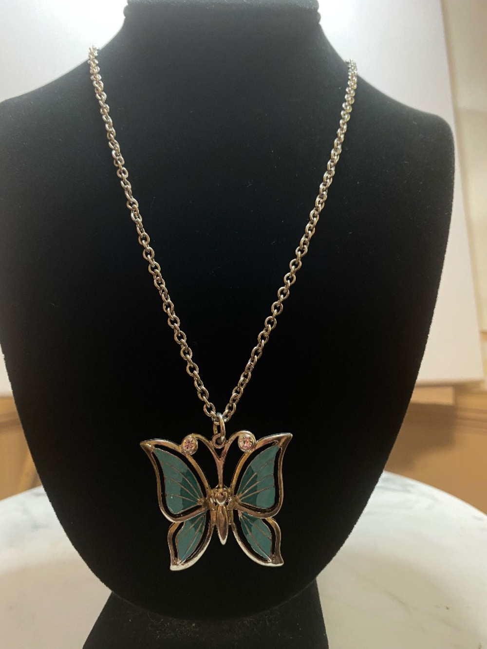 Turquoise butterfly on silver chain